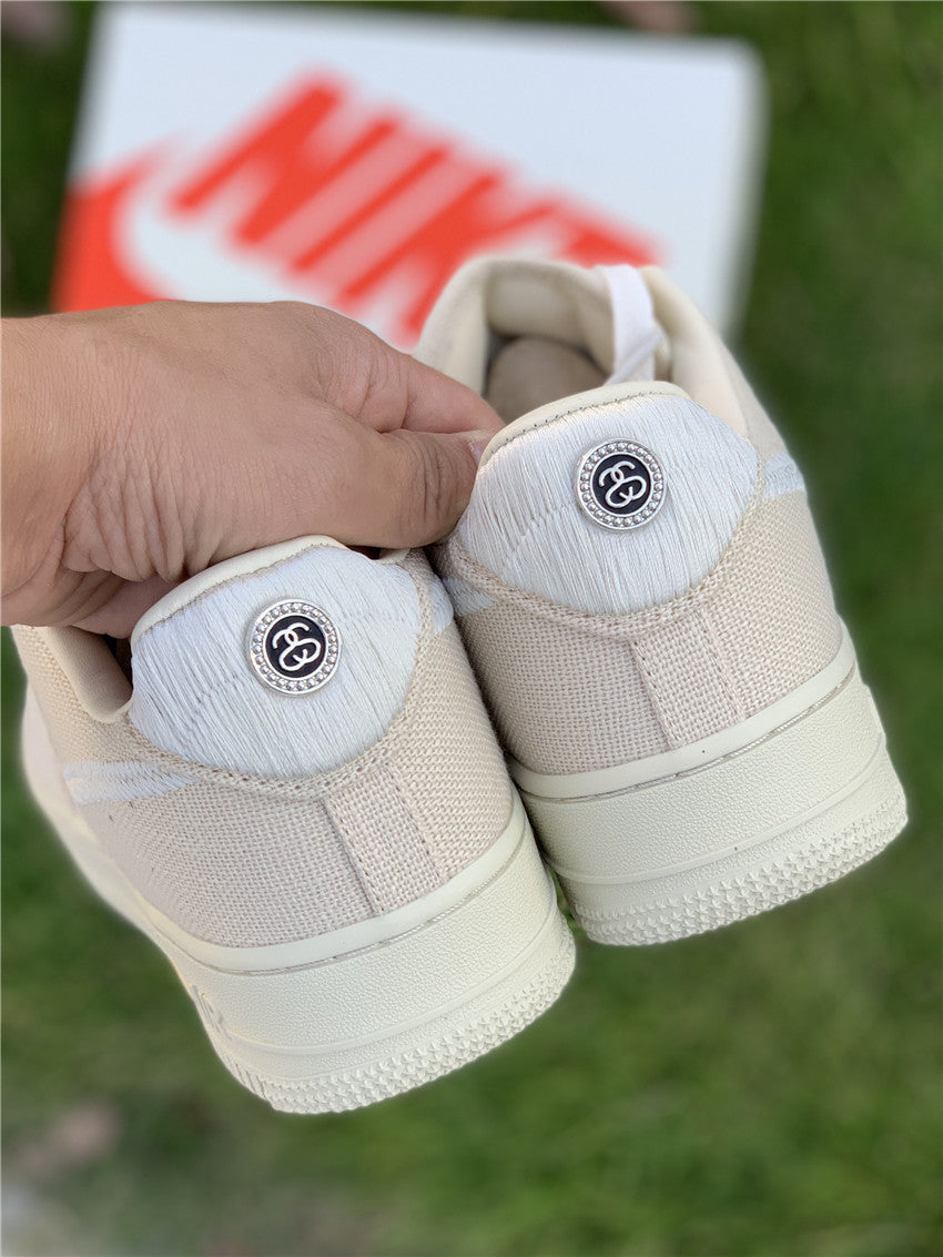 Stussy x Air Force 1 Low “Fossil Stone”